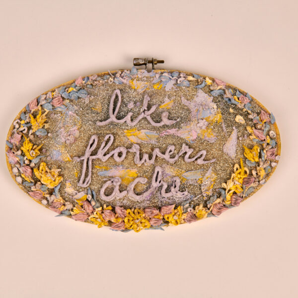 Holly Clark, “Like Flowers Ache”, oil paint, embroidery hoop, glitter, and canvas, 11” oval, 2020.